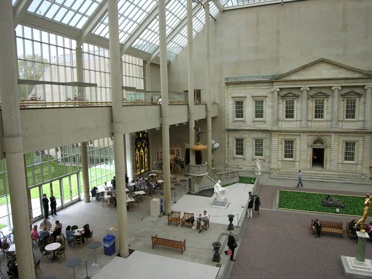 Interior view of the Metropolitan Museum of Art's Great Hall with classical architecture and natural light