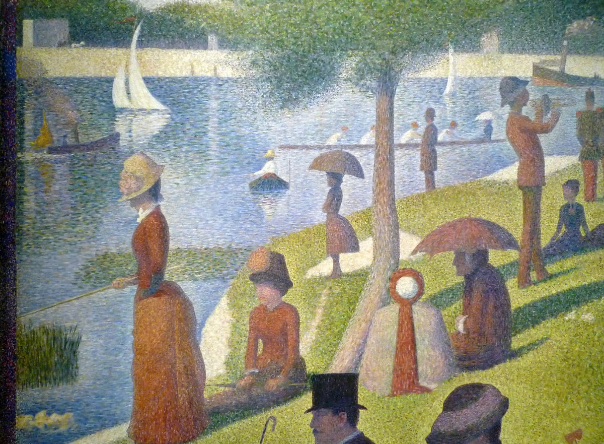 Detail of Seurat's A Sunday on La Grande Jatte showing people by the river with sailboats and trees, rendered in pointillism.