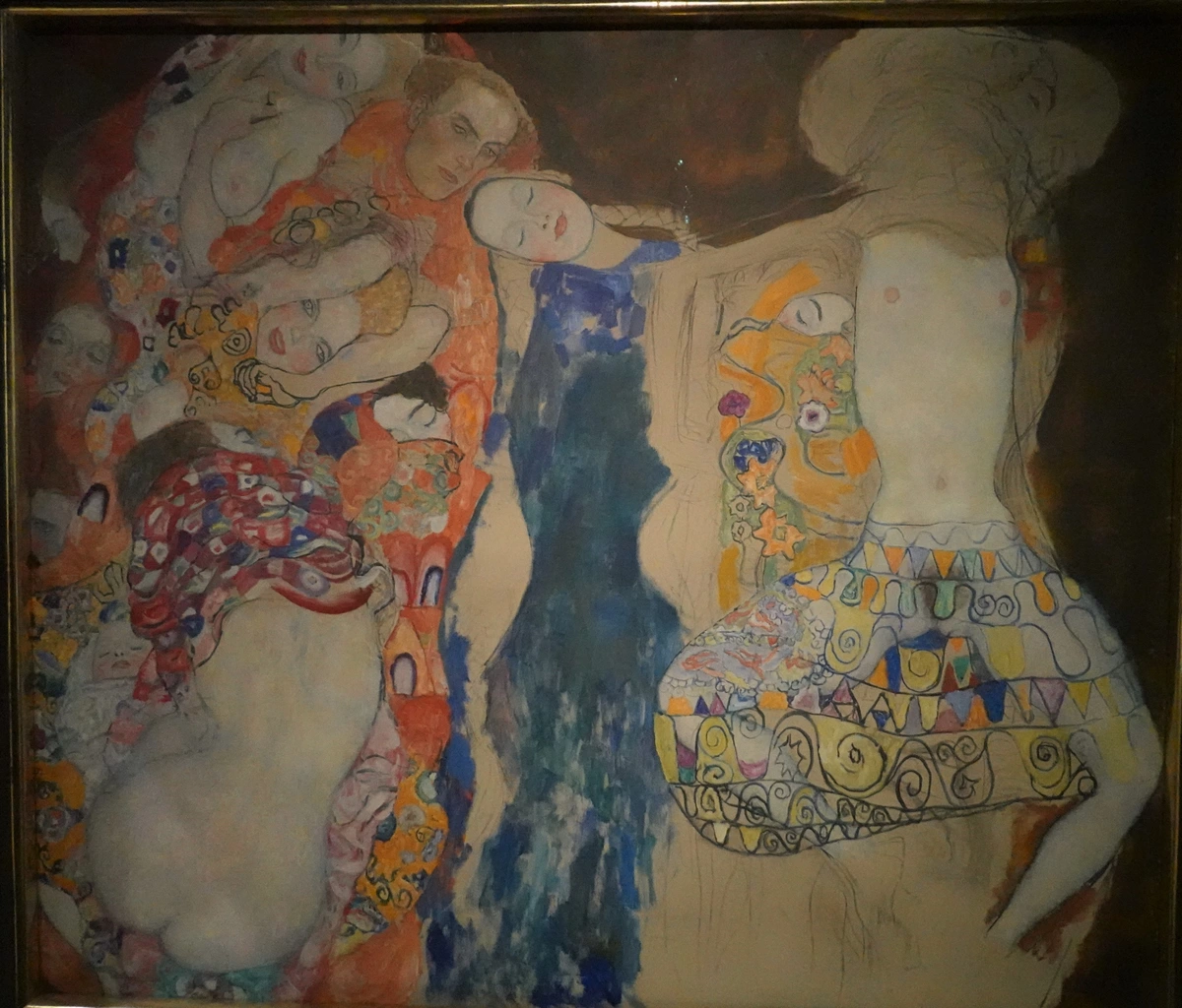 Gustav Klimt's 'The Bride' painting, featuring intertwined figures and decorative patterns, displayed at the Leopold Museum in Vienna.
