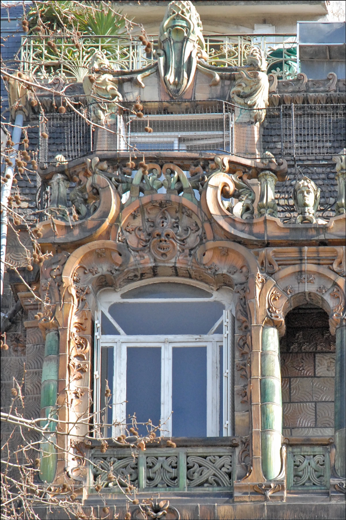Art Nouveau facade of the Immeuble Lavirotte by Jules Lavirotte in Paris, featuring intricate sculptures and decorative elements.