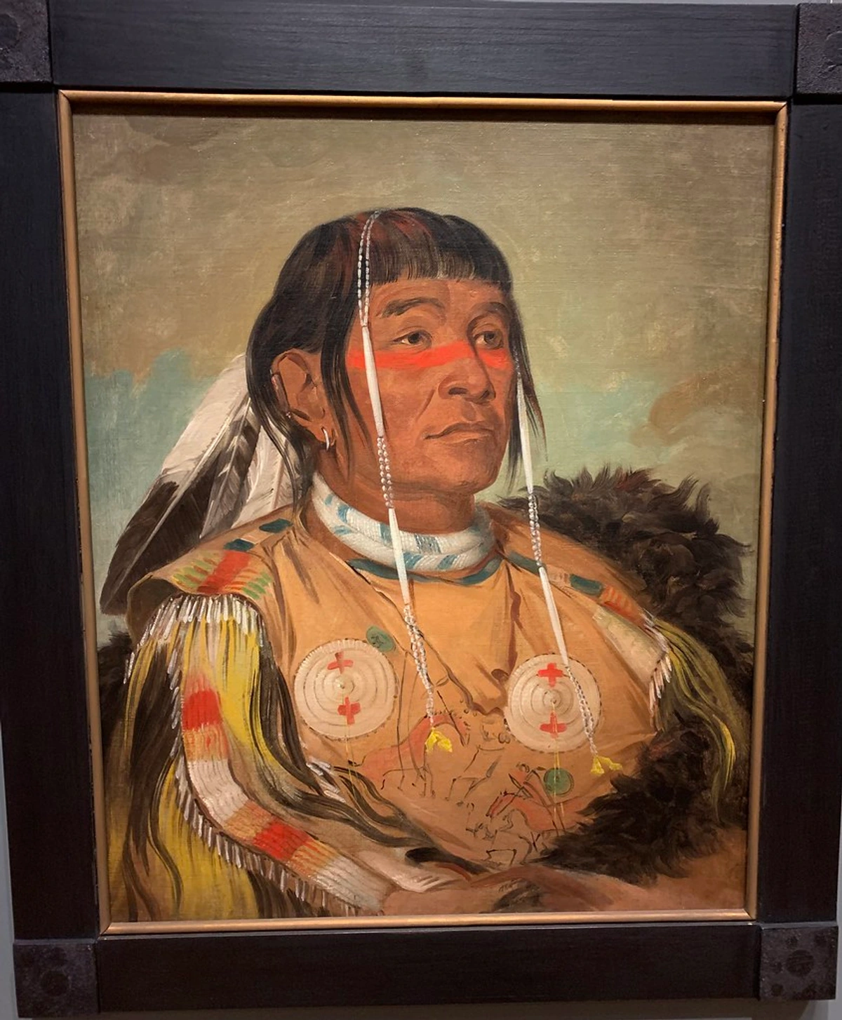 Traditional Native American portrait showcasing intricate beadwork and cultural symbols from the Smithsonian American Art Museum permanent collection