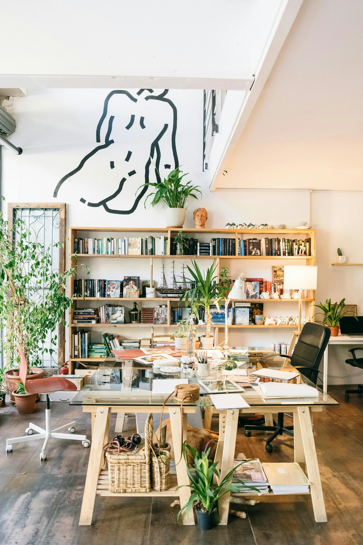 Art Studio Workspace with Tables and Art Supplies