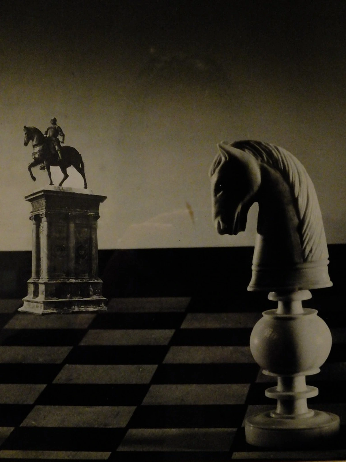 Chess knight statue inspired by Dora Maar and Picasso's 1936 artwork on black-and-white chessboard background