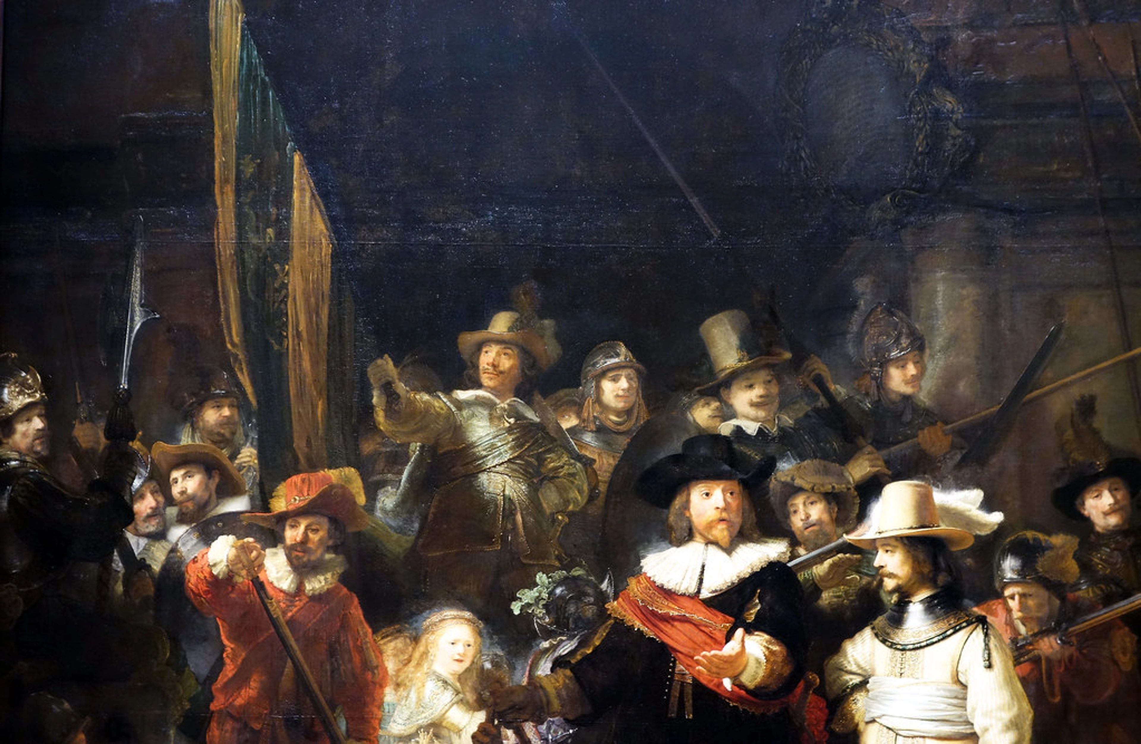 Rembrandt's The Night Watch: Dynamic detail with figures highlighting Baroque art mastery and enduring historical impact.