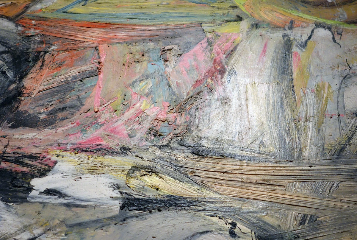 Detail of Willem de Kooning's abstract expressionist painting 'Woman I' (1950-52), showcasing thick impasto and bold brushstrokes.