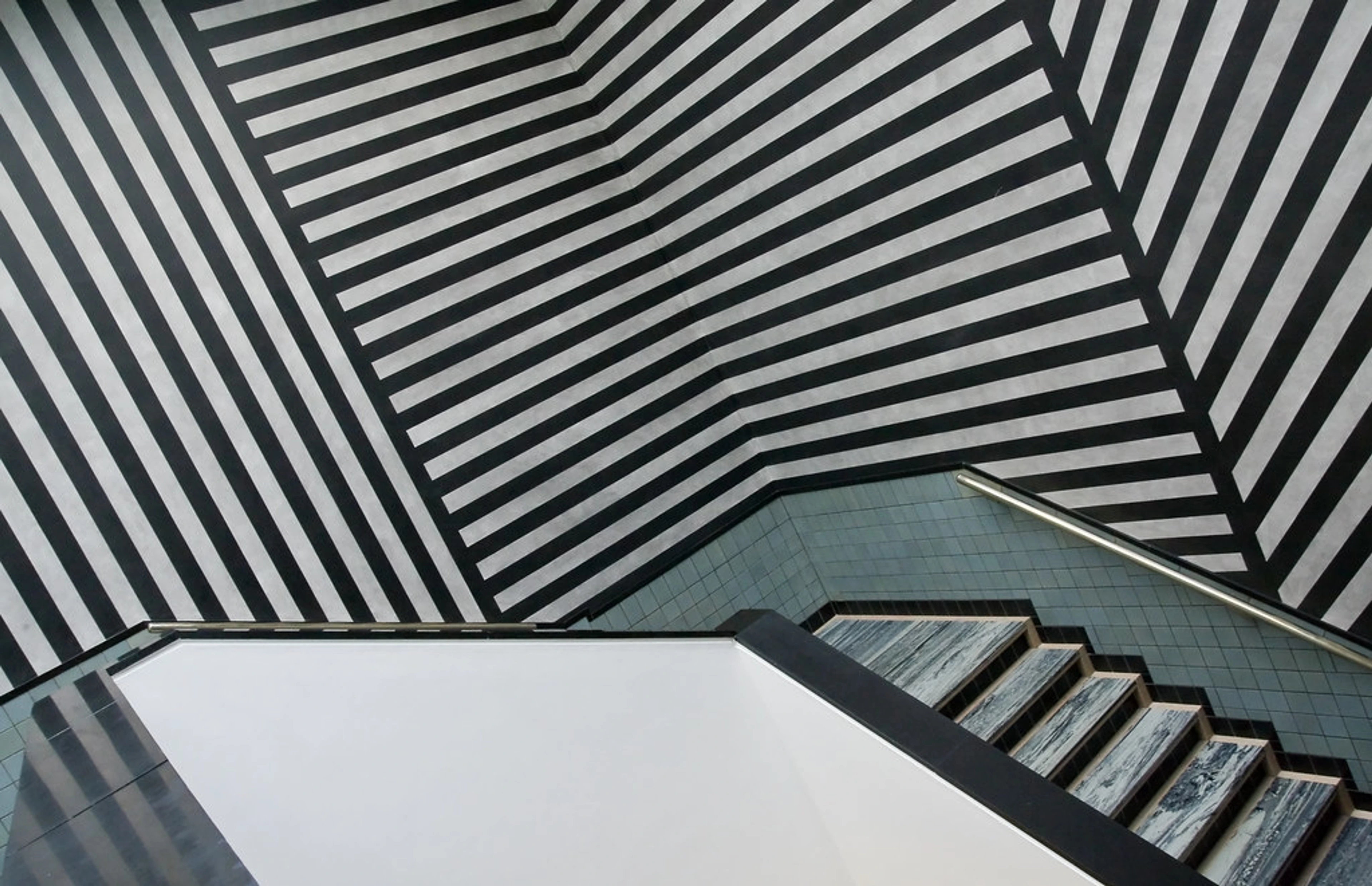 Sol LeWitt hallway design in the Gemeentemuseum Den Haag featuring black and white stripes in Dutch galerie