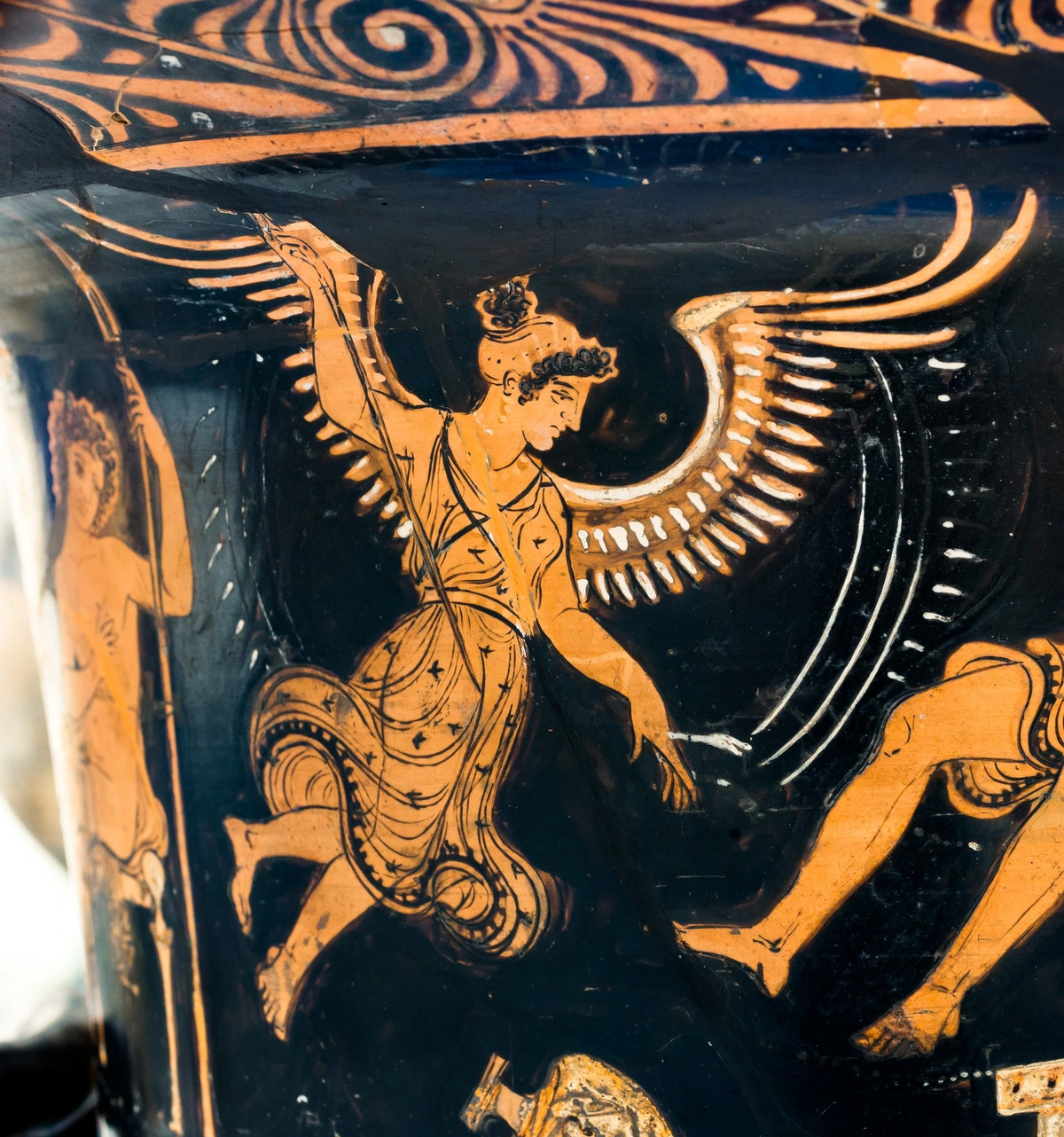 Ancient Greek vase painting depicting Lyssa, the spirit of rage, with wings, in orange and black figures, circa 350-340 BC.
