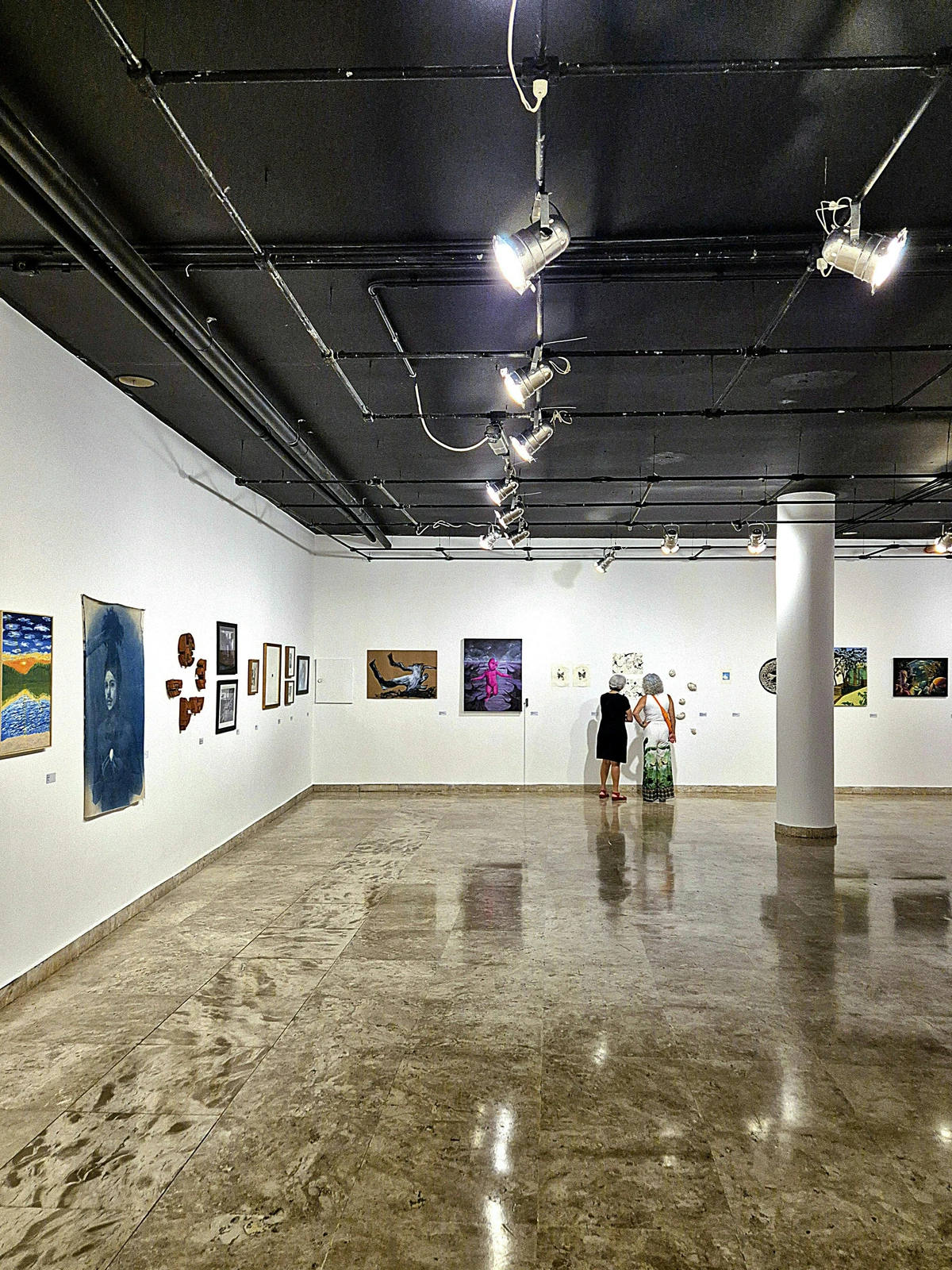 Modern Art Gallery in Minas Gerais, Brazil showcasing diverse artworks for informed decision-making