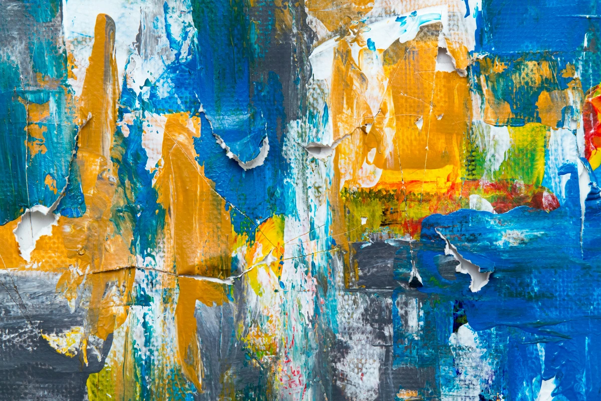 Multicolored abstract painting showcasing vibrant textures and dynamic brushstrokes.