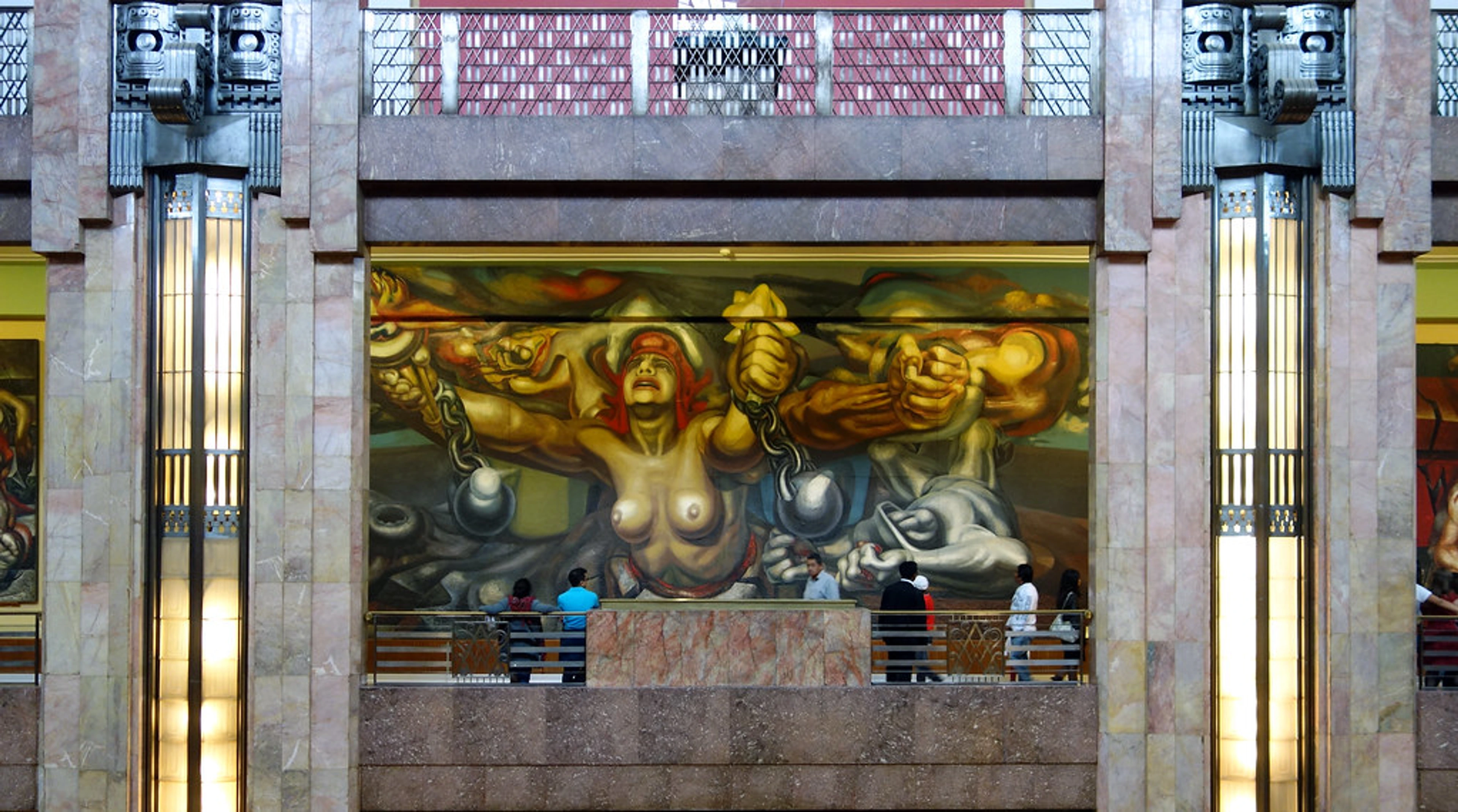 David Alfaro Siqueiros' 'New Democracy' mural, depicting a woman breaking free from chains, symbolizing social and political revolution.