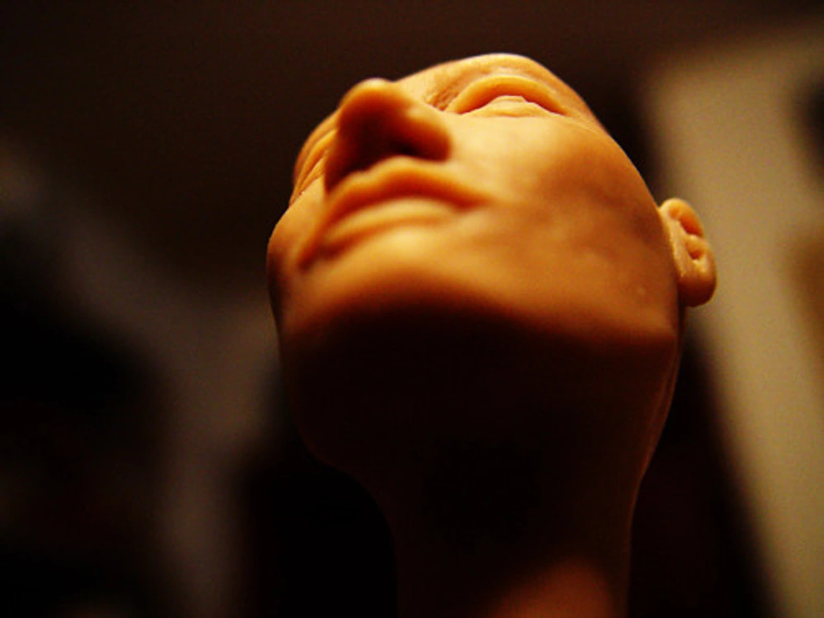 Transformative clay sculpture symbolizing inner power and personal growth