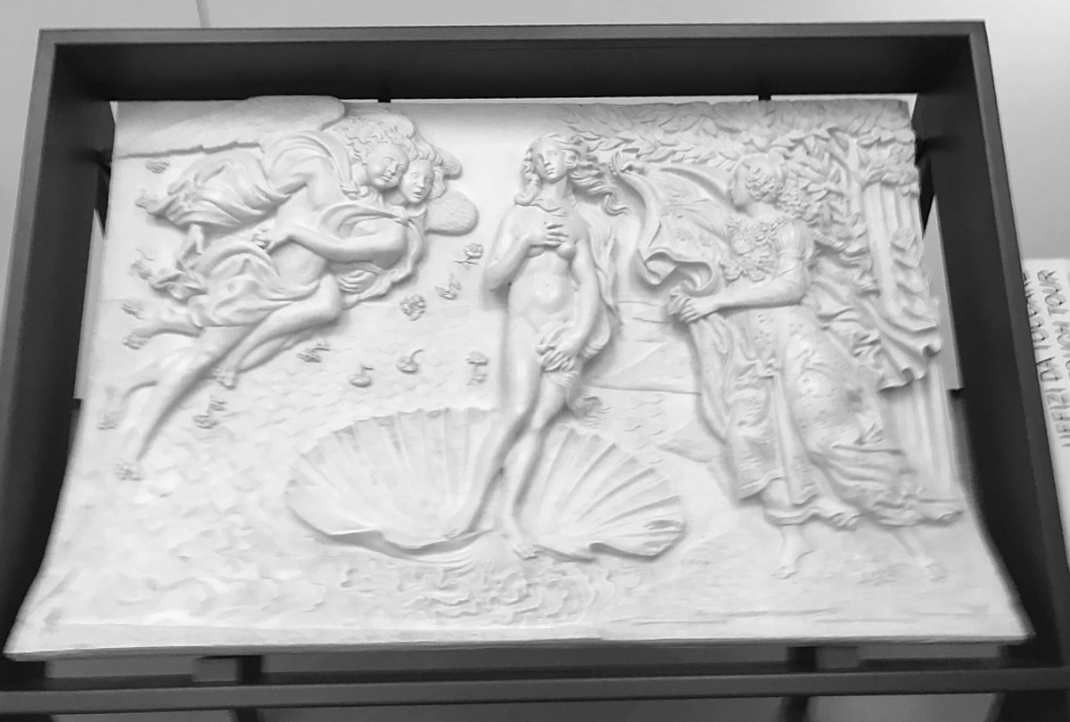 Relief sculpture depicting Botticelli's The Birth of Venus, showing Venus emerging from a seashell, flanked by Zephyrus and a Horae.