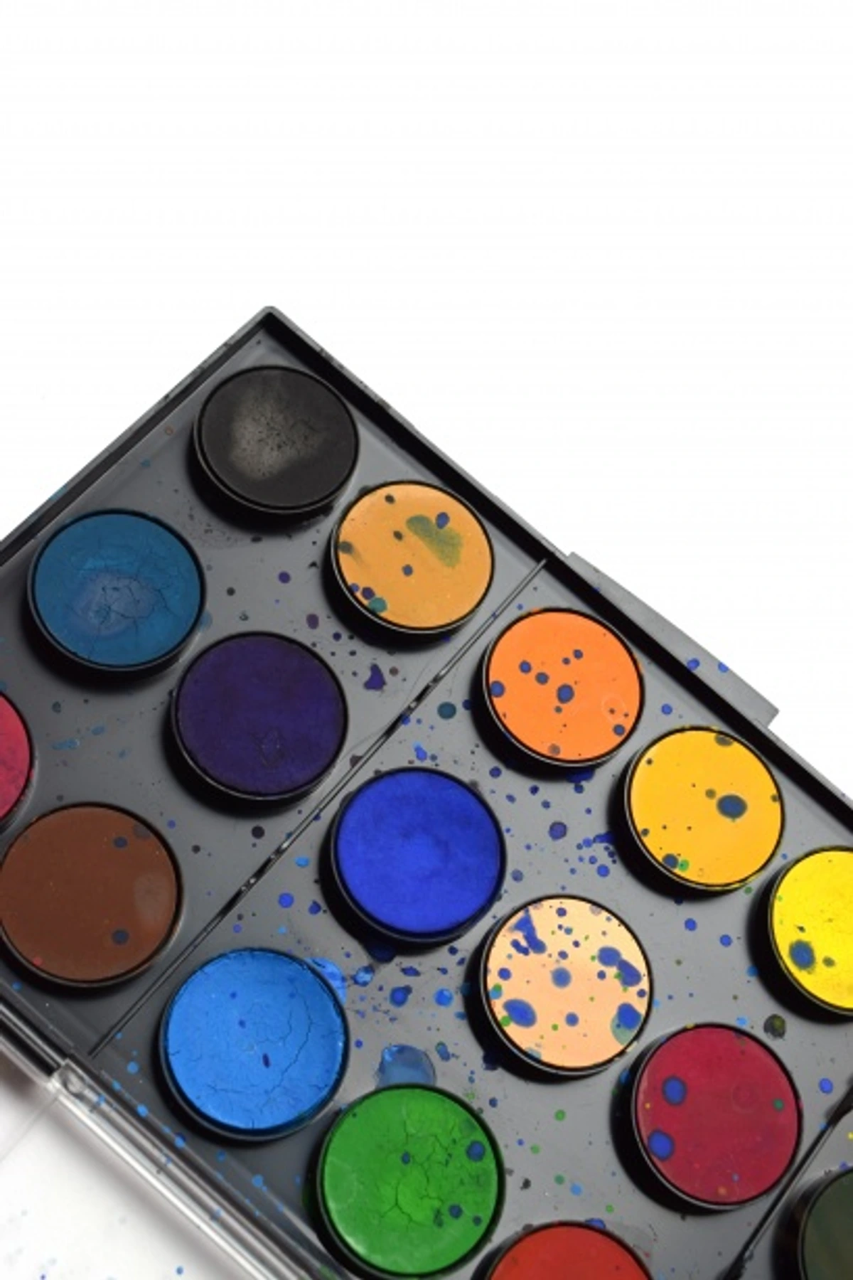 Art Palette with Vibrant Paint Colors and Splatters