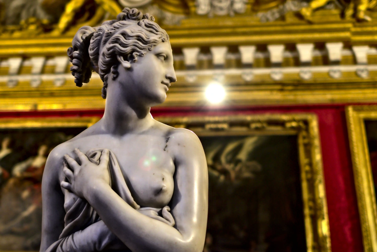 Close-up of the marble sculpture Venere Italica by Antonio Canova, showcasing neoclassical style.