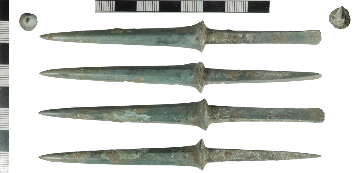 Three Age System artifacts: Stone, Bronze, and Iron Age tools depicting leatherworker's awl from Bronze Age metallurgy and ancient craftsmanship.