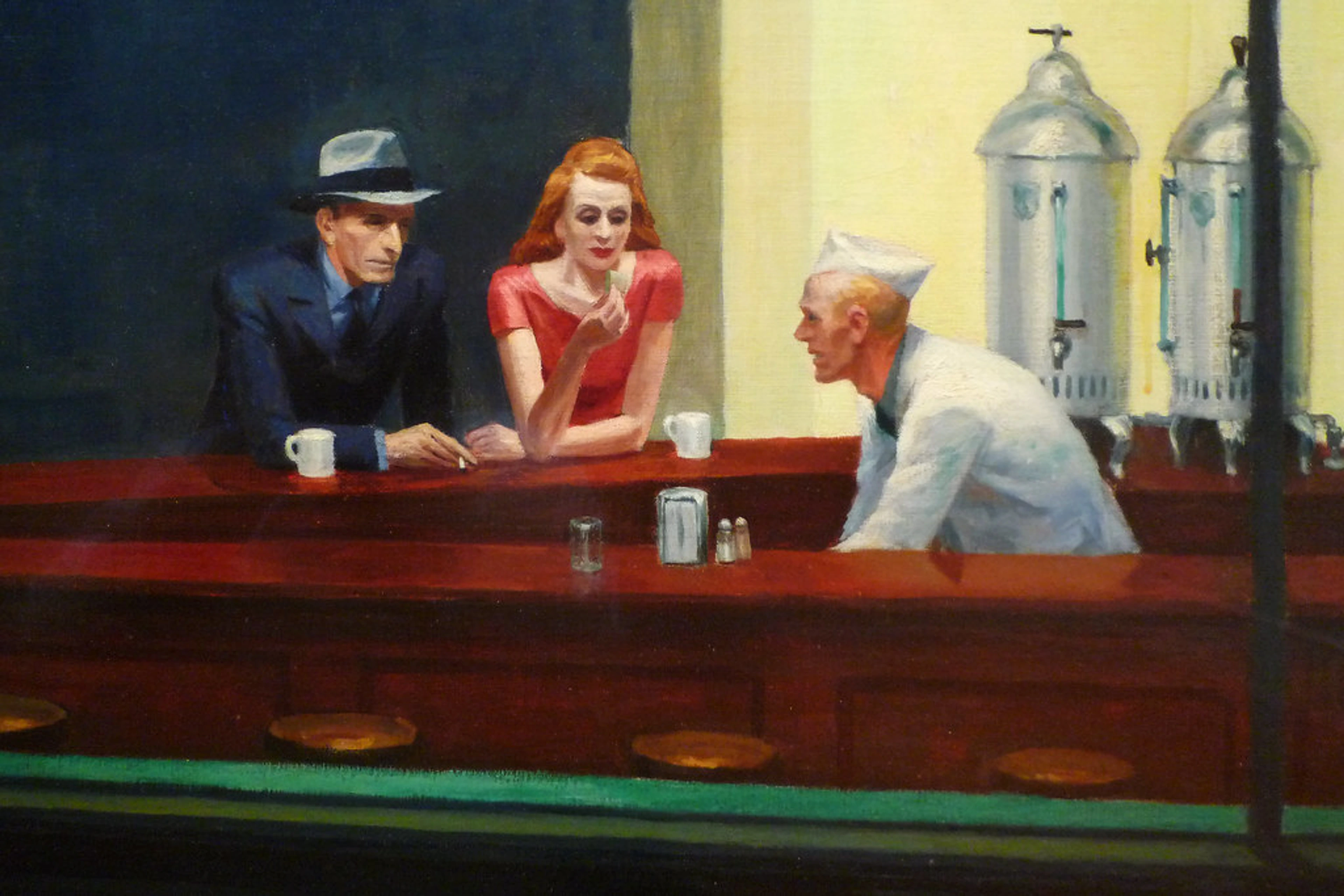 Edward Hopper's Nighthawks painting showing a man in a hat, a woman in a red dress, and a server in a diner