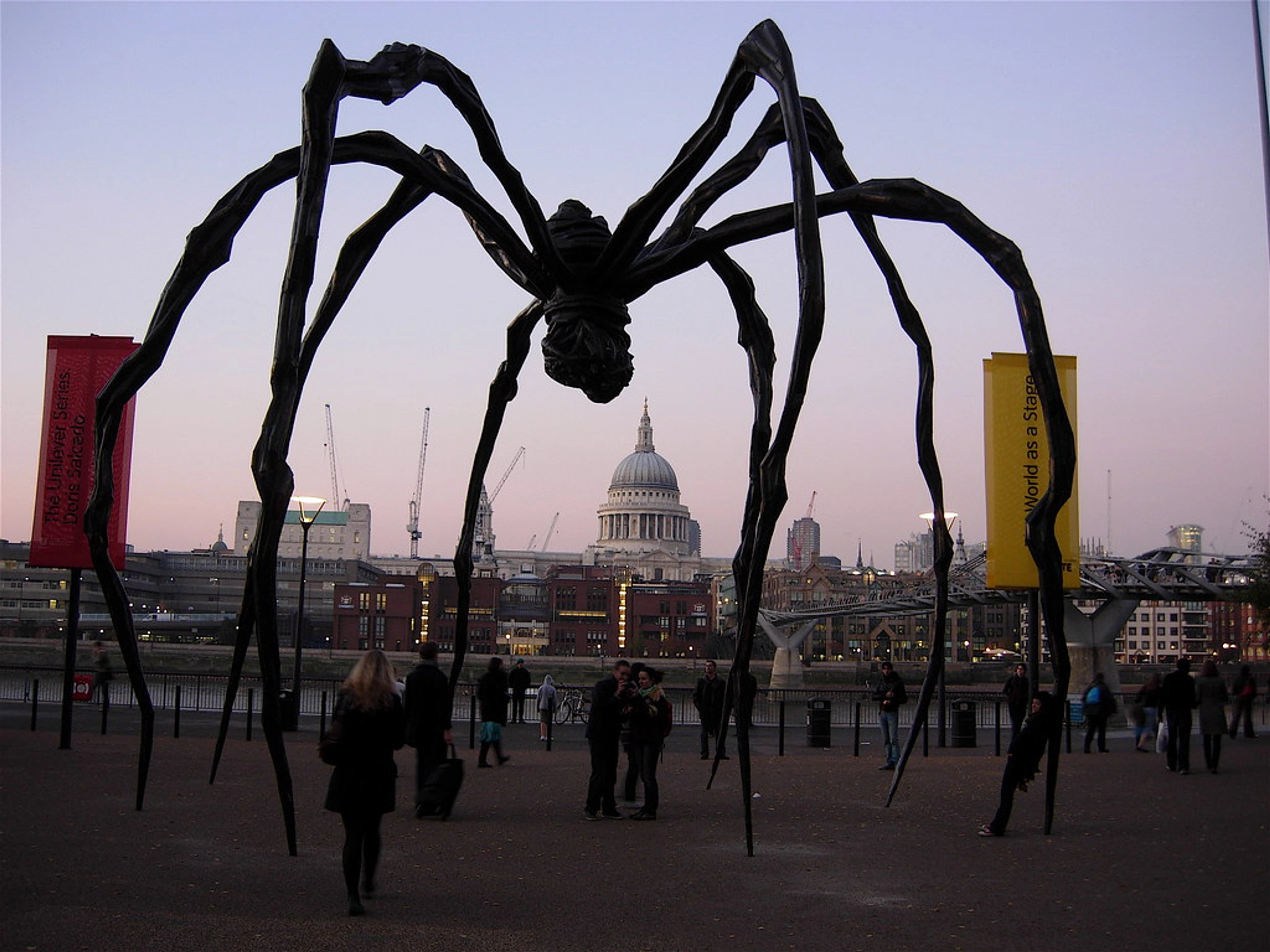 Maman spider sculpture by Louise Bourgeois outside Tate Modern in London at dusk