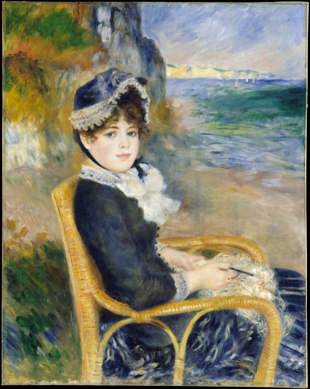 Pierre-Auguste Renoir's painting 'By the Seashore' depicts a young woman in a blue dress and hat, sitting in a wicker chair by the sea, holding knitting needles and yarn.