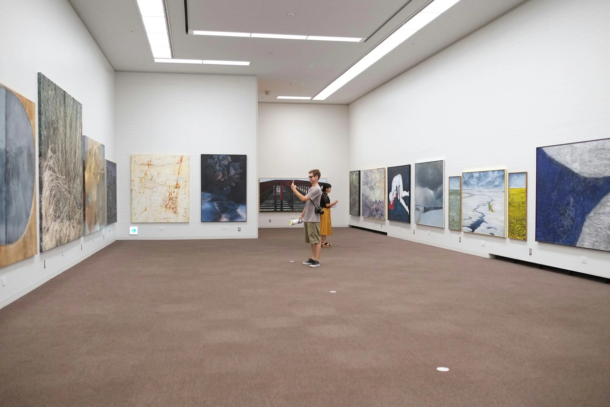 It is an art gallery with modern interpretations of paintings and intricate concepts in its realism. Visitors and artists gather around to capture the essence with pictures that question perceived realities and philosophical art forms that stimulate rational thinking. It is a stock photo free for use on trips and museums in the country.