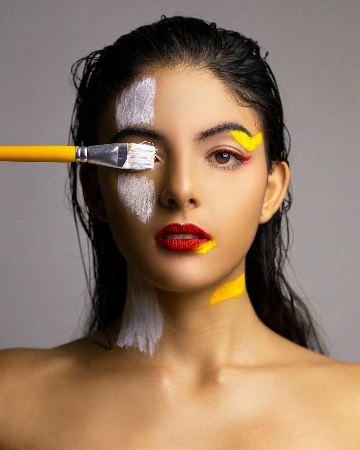 Woman covering eye with painting brush - Free Stock Photo for education on synthetic brushes