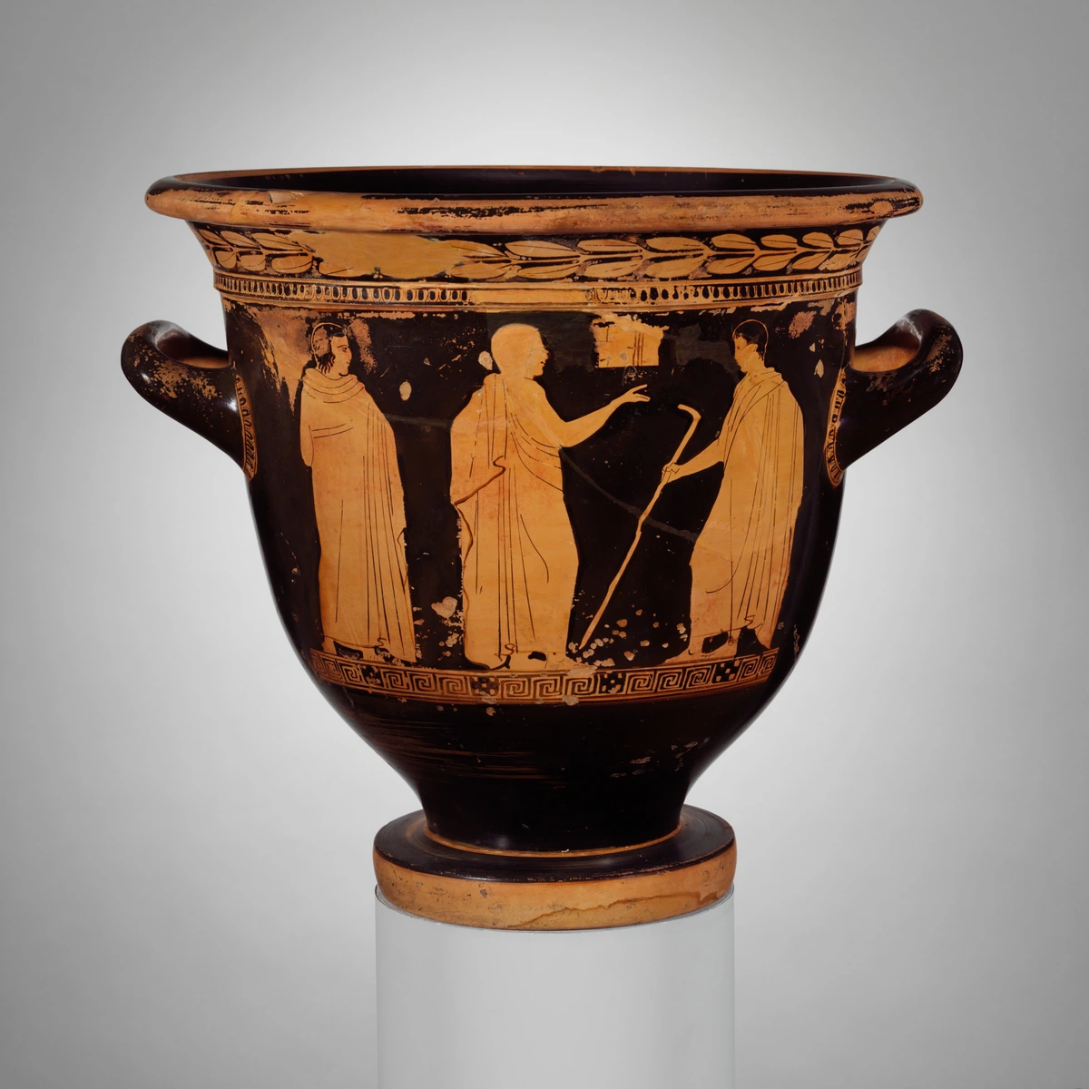 Terracotta bell-krater, an ancient Greek pottery vessel used for mixing wine and water, featuring red-figure decoration of human figures.