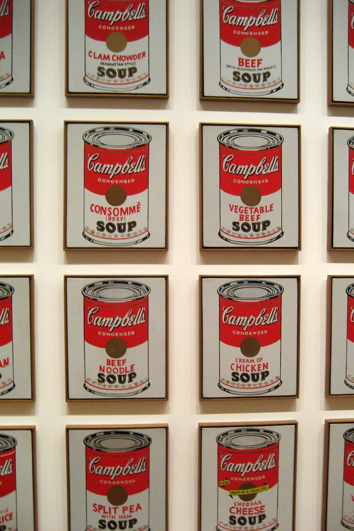 Andy Warhol's Campbell's Soup Cans series displayed at MoMA, featuring multiple iconic soup can artworks.