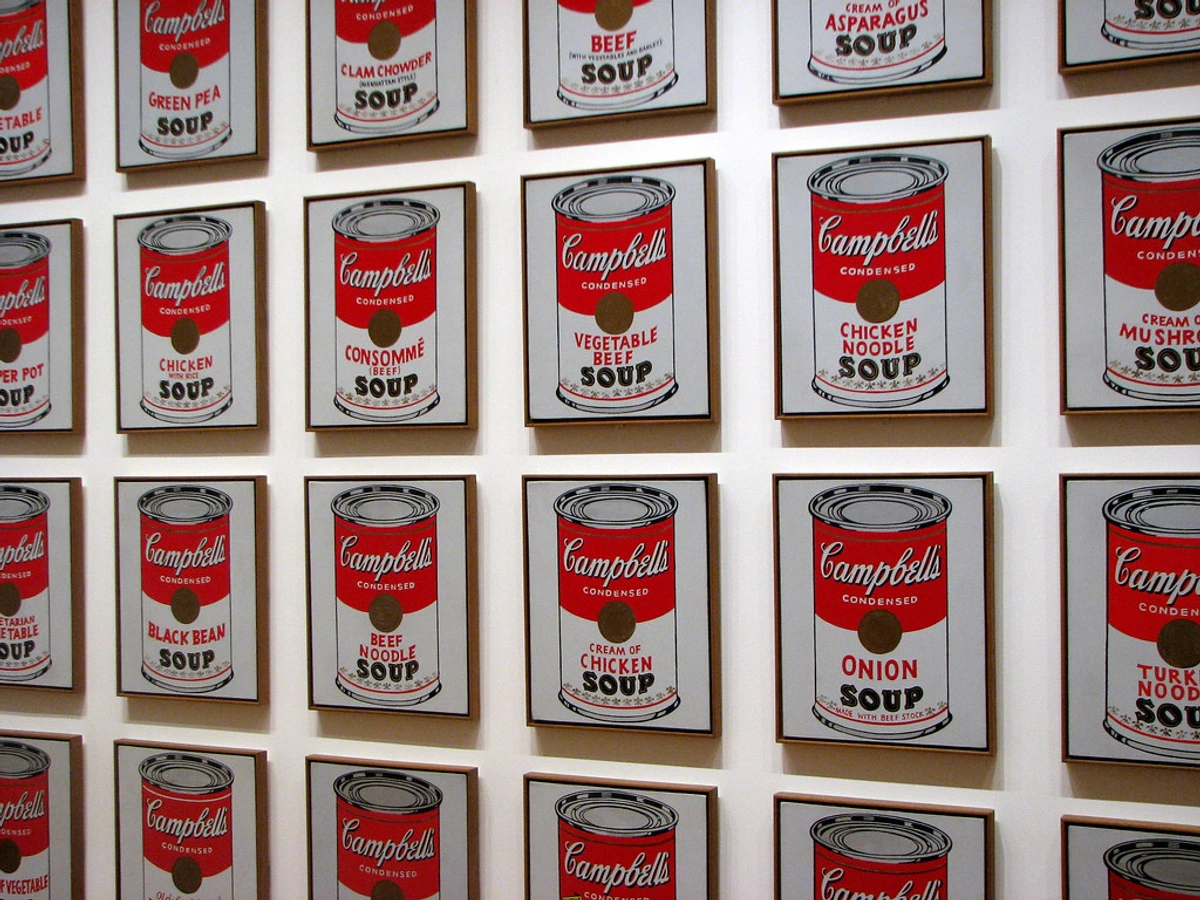Andy Warhol's Campbell's Soup Cans artwork featuring multiple varieties of soup cans.