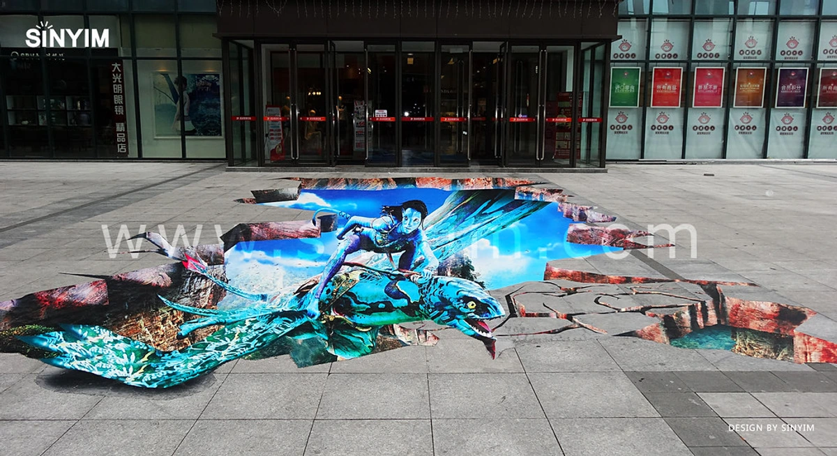 3D anamorphic floor art depicting characters from the movie Avatar riding a flying creature, designed for market promotion.