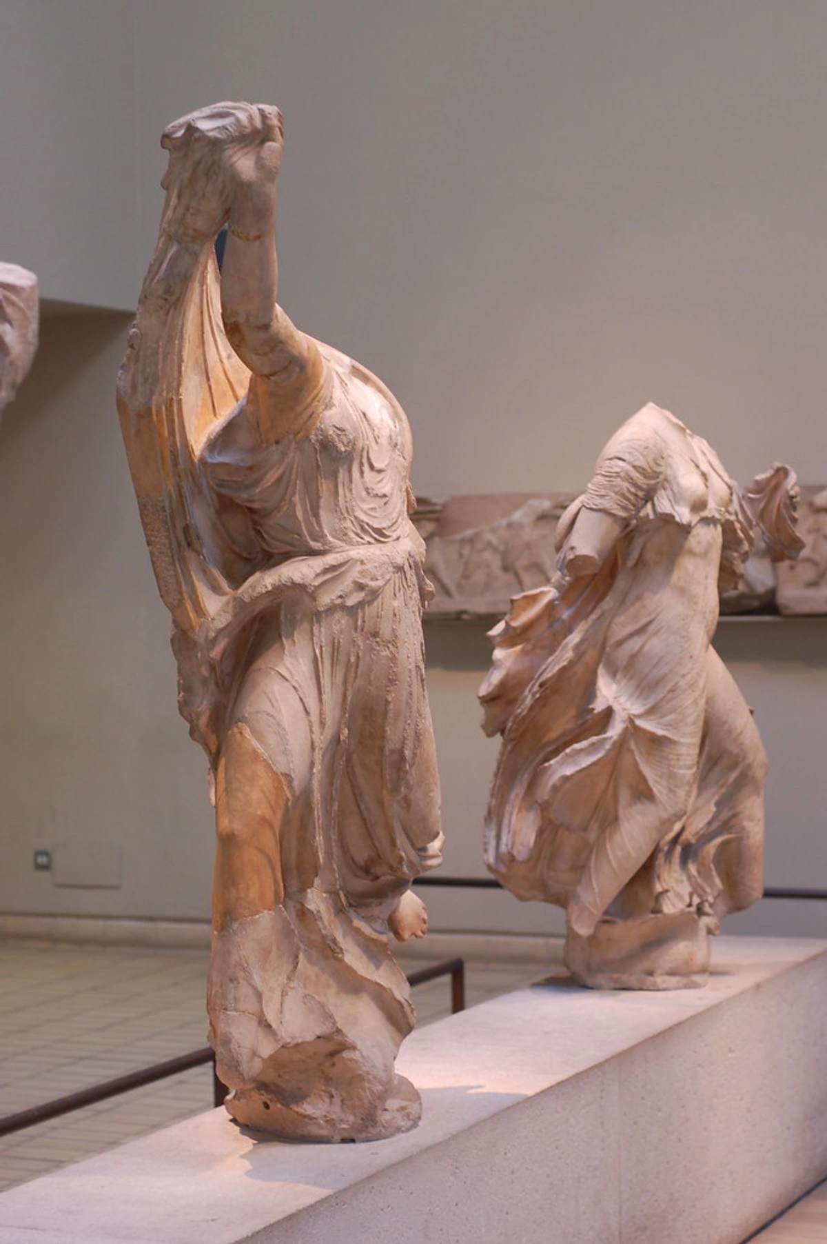 Statues from the Elgin Marbles at the British Museum showcasing ancient Greek sculpture in meticulous detail, reflecting classical antiquity and cultural heritage.