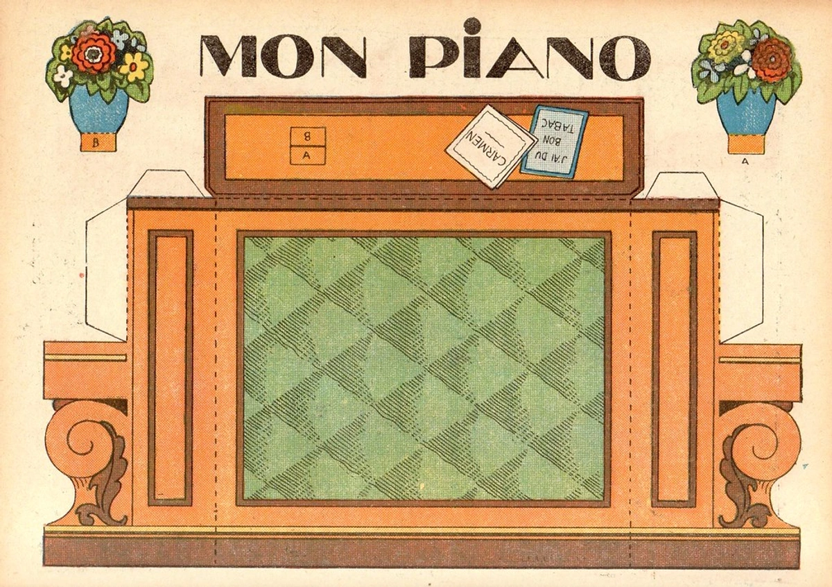 Vintage papercraft model of a piano with decorative flowers and sheet music elements.