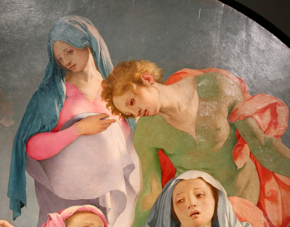 Pontormo's Deposition from the Cross (1525-28), a Mannerist masterpiece depicting emotional figures in vibrant colors.
