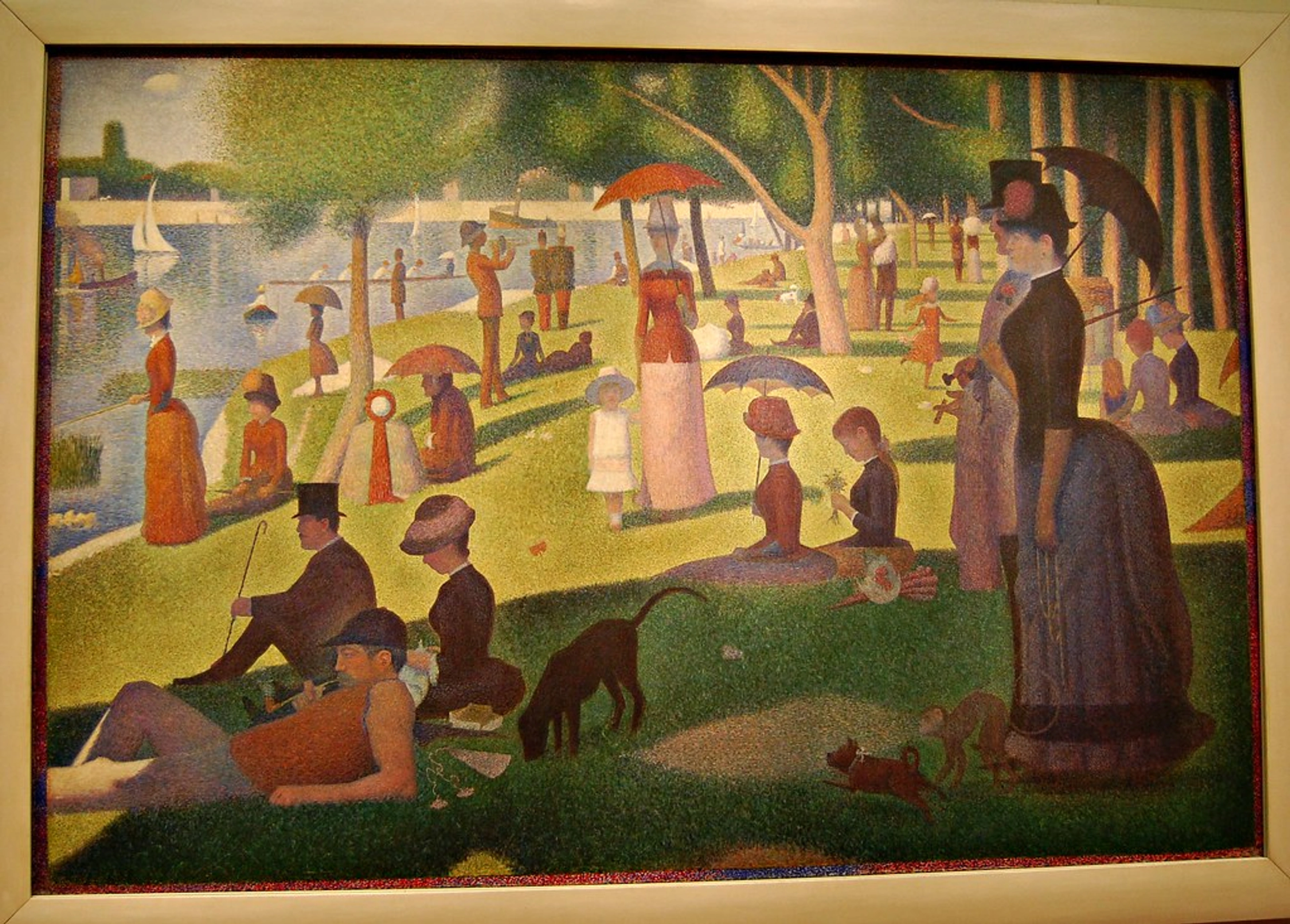 Georges Seurat's 'A Sunday on La Grande Jatte' painting, showcasing pointillism technique with people enjoying a park by the river.