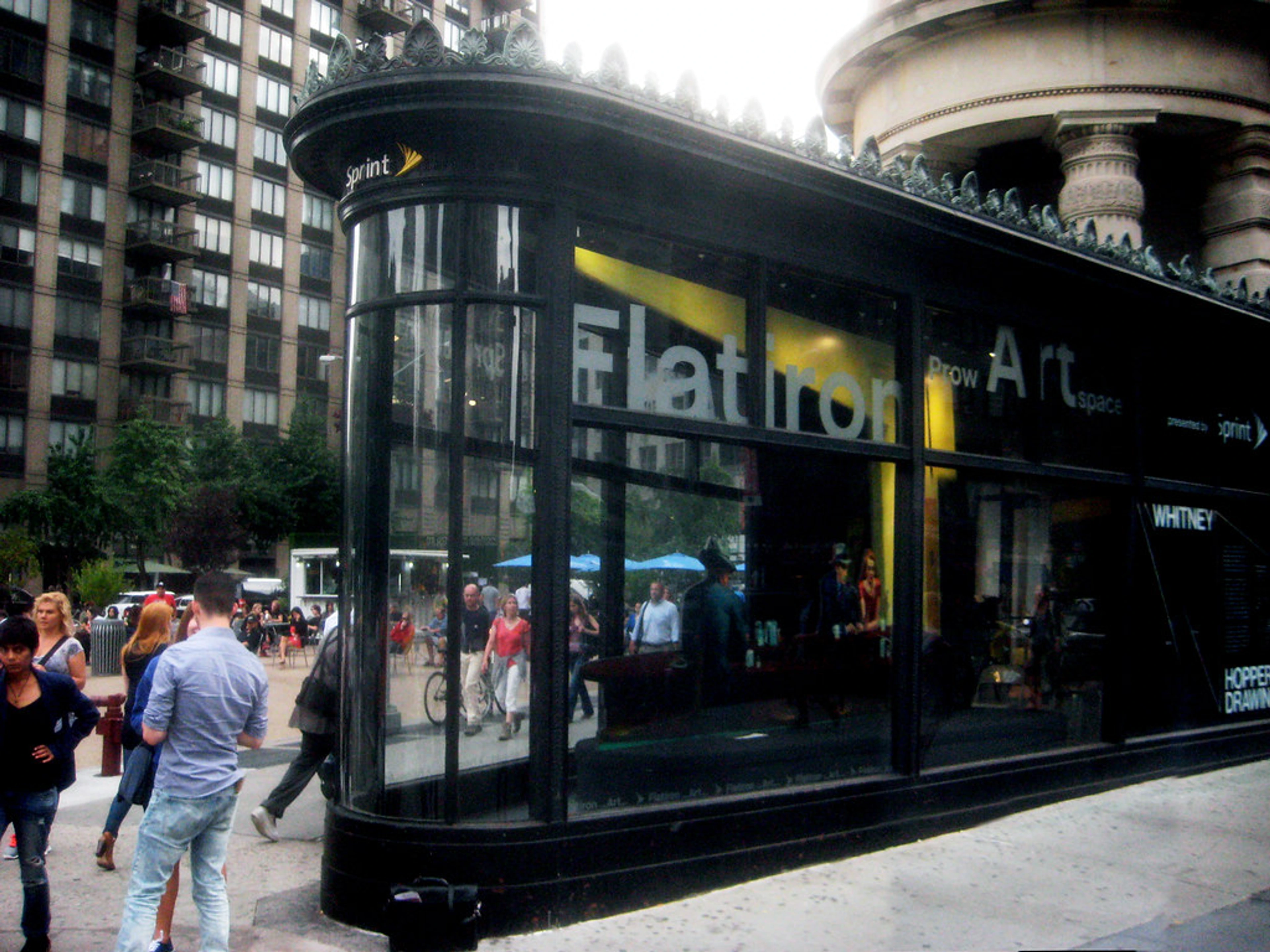 Reenactment of Edward Hopper's Nighthawks painting displayed in the Flatiron Building Art Space, New York City.