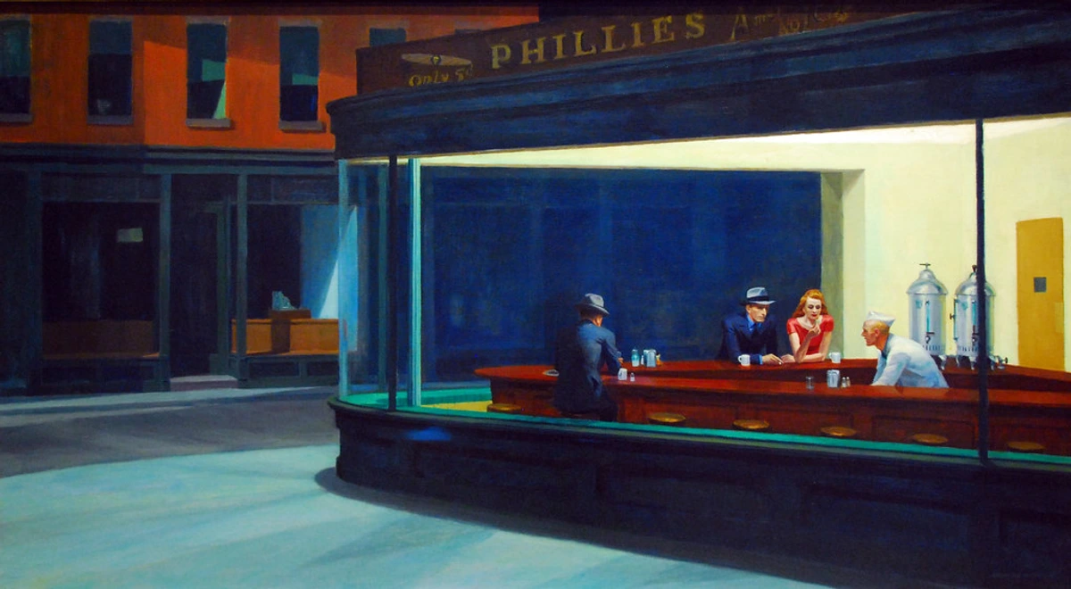 Edward Hopper's Nighthawks painting depicting three customers and a bartender in a brightly lit diner late at night, conveying urban isolation.