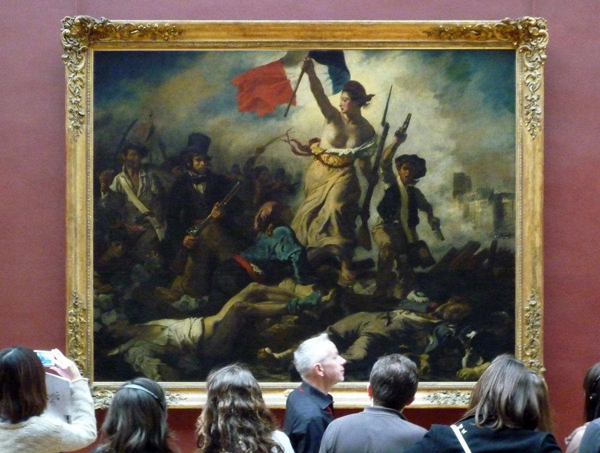 Eugène Delacroix's 'Liberty Leading the People' painting, depicting Marianne holding the French tricolor flag and leading revolutionaries over a barricade of fallen figures, with viewers observing in the foreground.