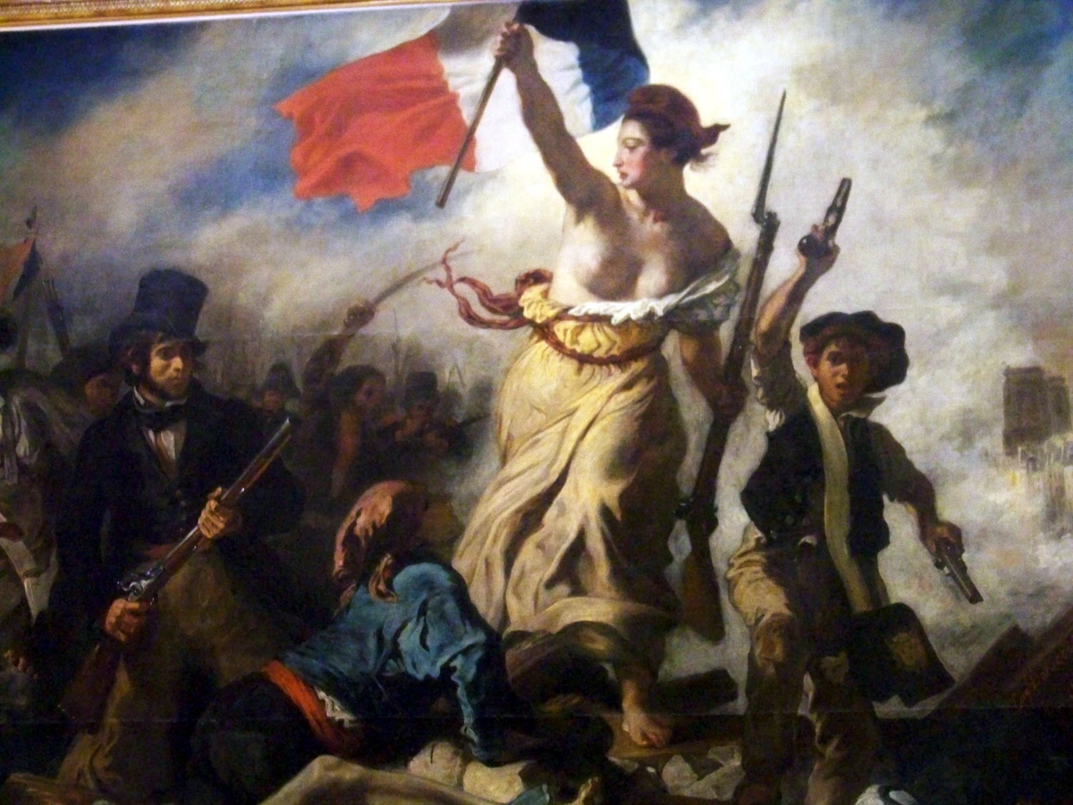 Detail van "De Vrijheid leidt het Volk" van Eugène Delacroix, met de Vrijheid die de Franse vlag en een geweer vasthoudt te midden van een revolutionaire scène.