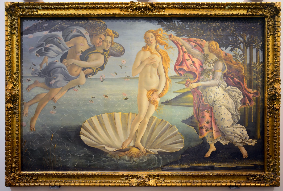 The Birth of Venus by Sandro Botticelli, a Renaissance masterpiece depicting the goddess Venus arriving on a seashell.