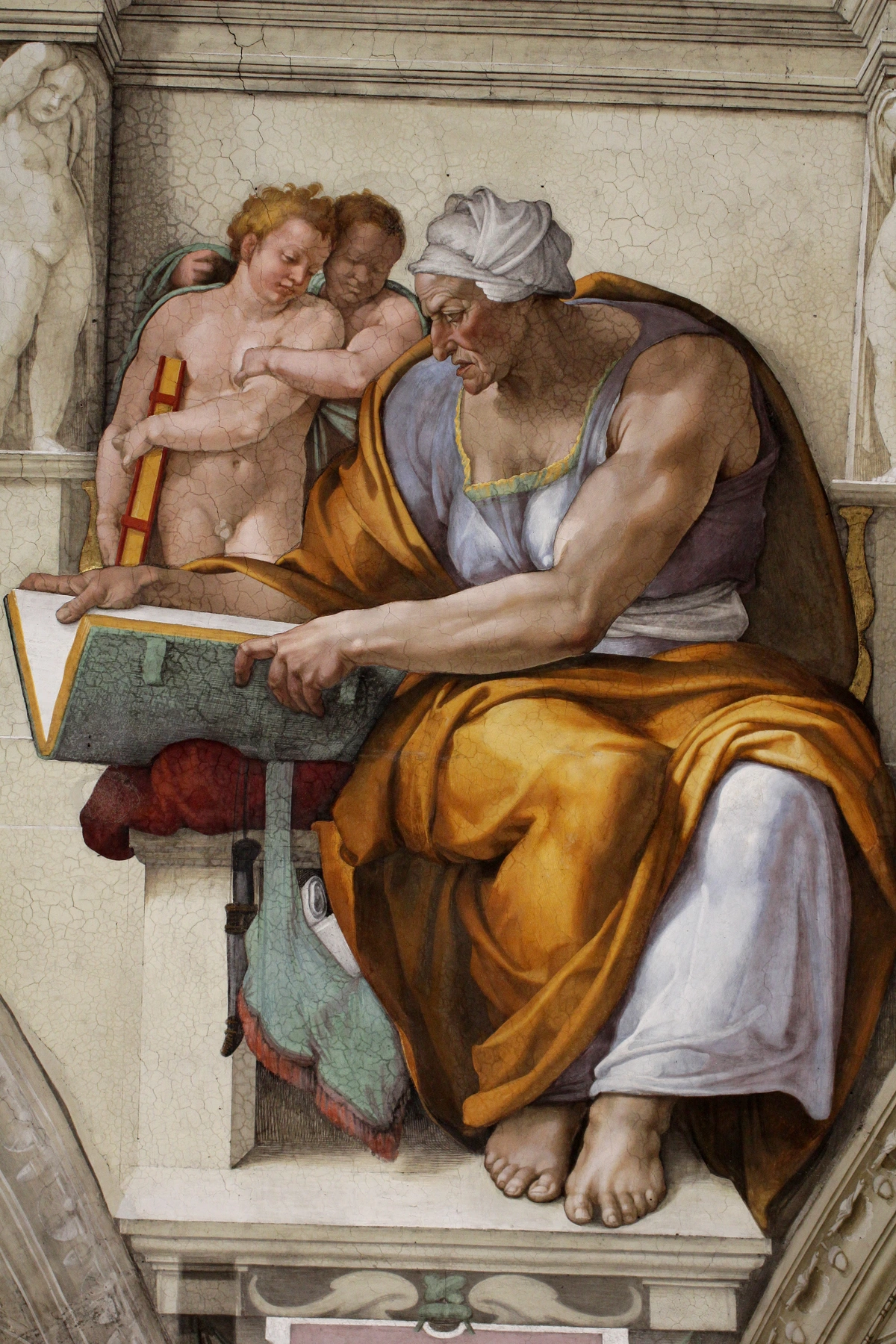 The Cumaean Sibyl, a fresco by Michelangelo on the Sistine Chapel ceiling, depicts a prophetess reading a book, accompanied by putti.