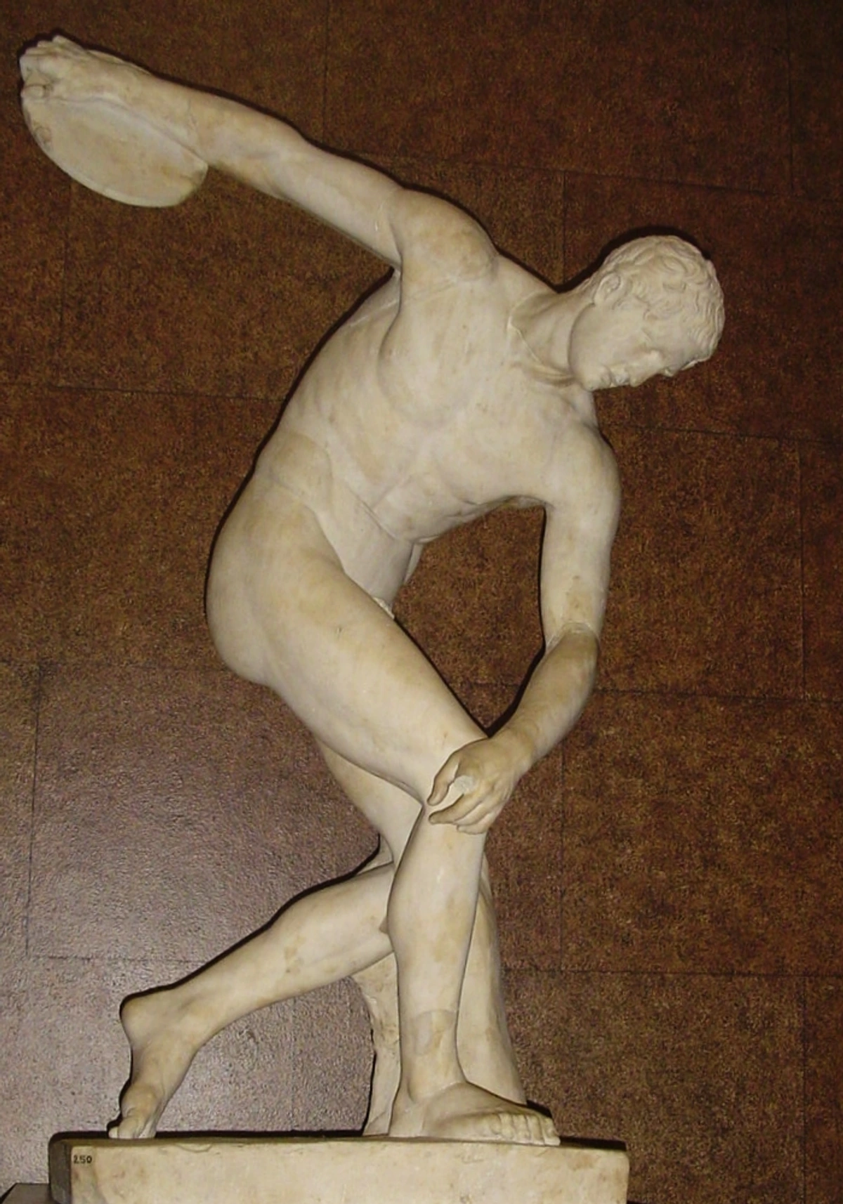 Marble statue of the Discobolus, an ancient Greek sculpture depicting an athlete in the act of throwing a discus.