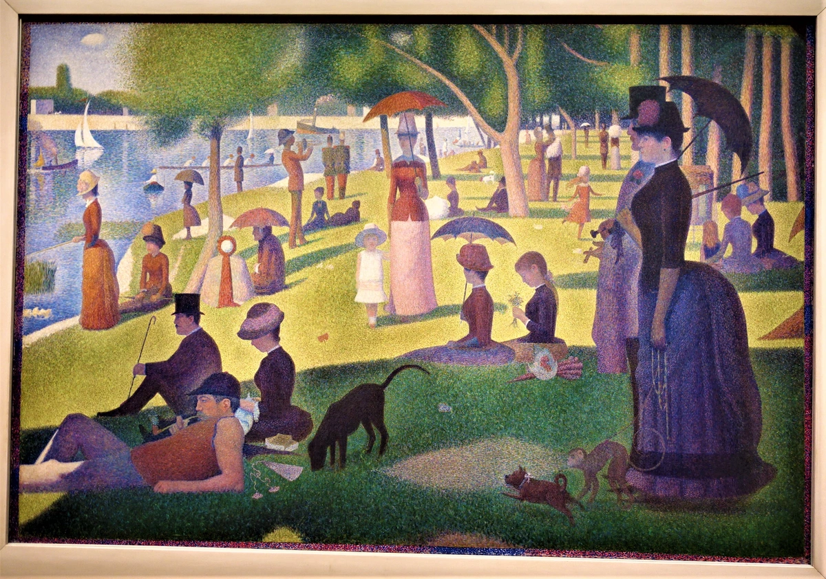 A Sunday on La Grande Jatte by Georges Seurat, a Pointillist masterpiece depicting Parisians enjoying leisure time by the Seine River.