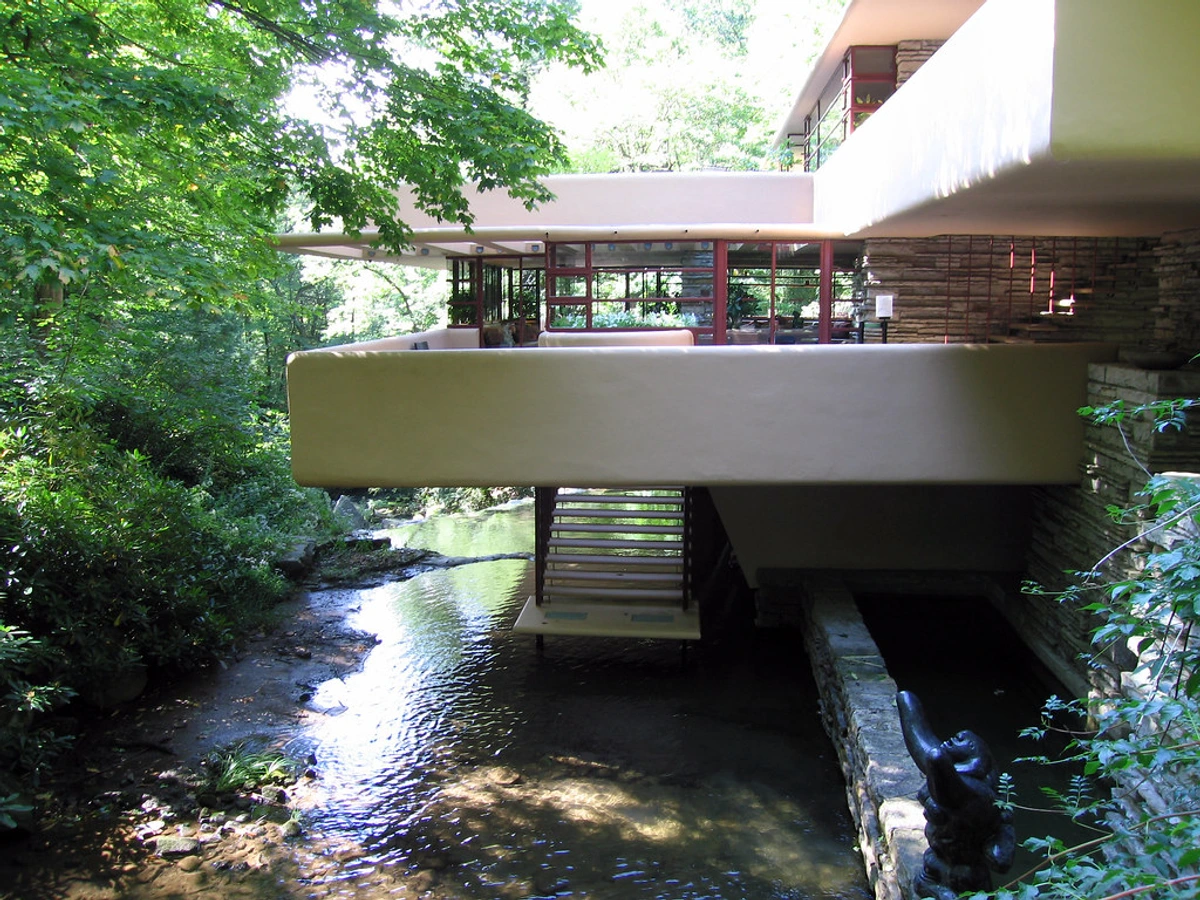 Fallingwater House by Frank Lloyd Wright, a cantilevered architectural masterpiece over a waterfall.