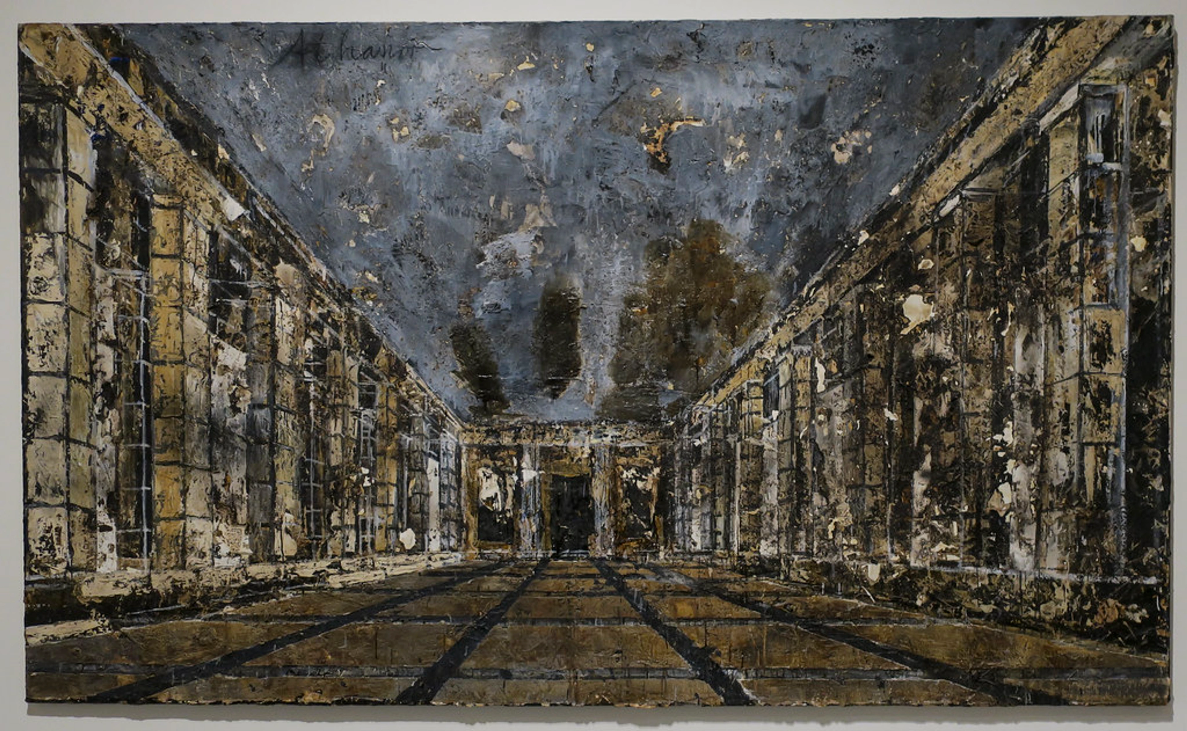Anselm Kiefer painting depicting a long, dark, textured interior hall with columns and a gridded floor, characteristic of his monumental style.