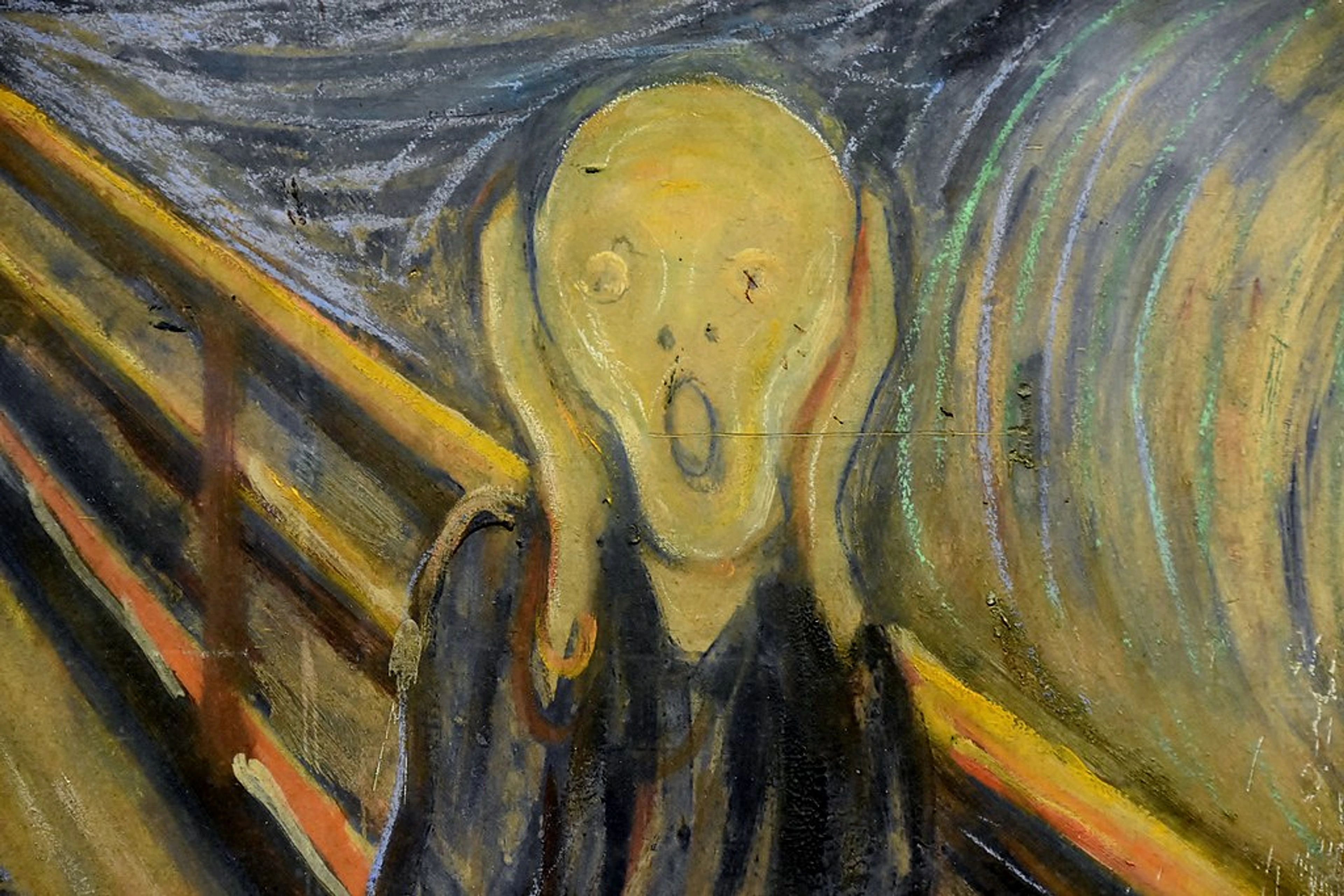 Edvard Munch's "The Scream" depicting a figure with an anguished expression against a turbulent, swirling background and a dramatic orange sky.