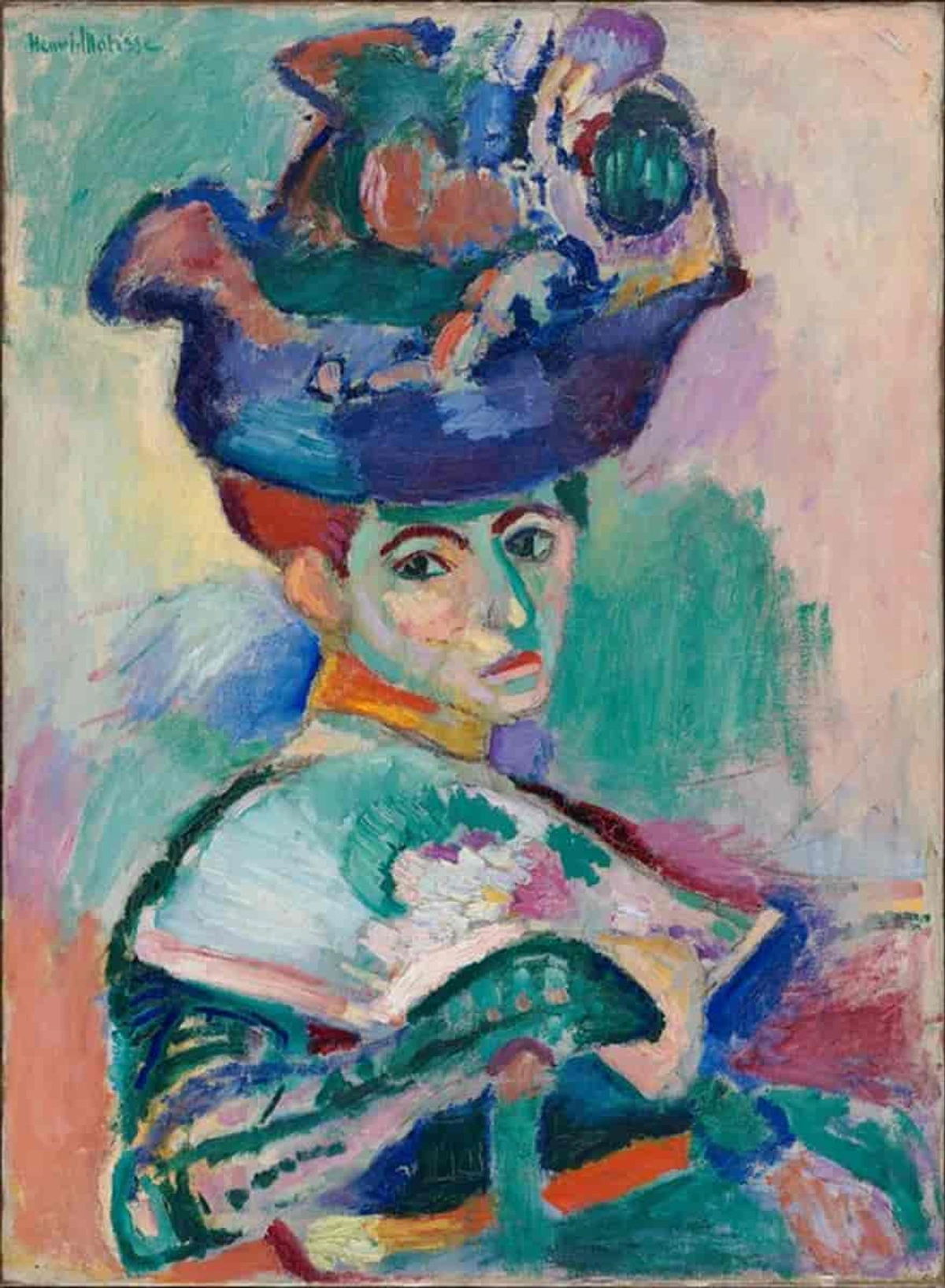 Portrait of a woman with red hair wearing a large, colorful hat, painted in the Fauvist style with bold, non-naturalistic colors.