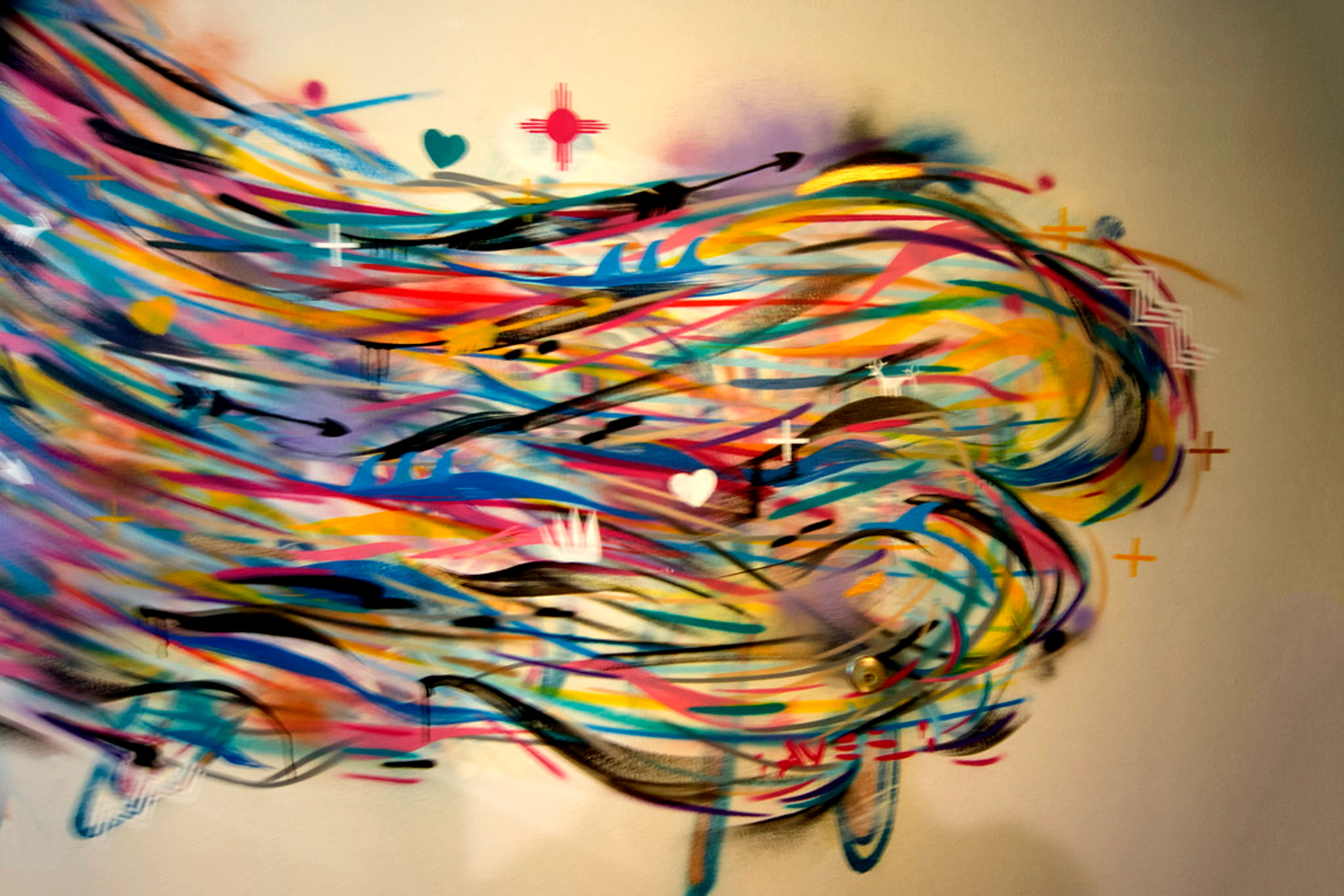 Vibrant abstract artwork with colorful swirling lines and symbolic elements like hearts, arrows, and crosses, titled "Winds of Change" by Jay Smiley.