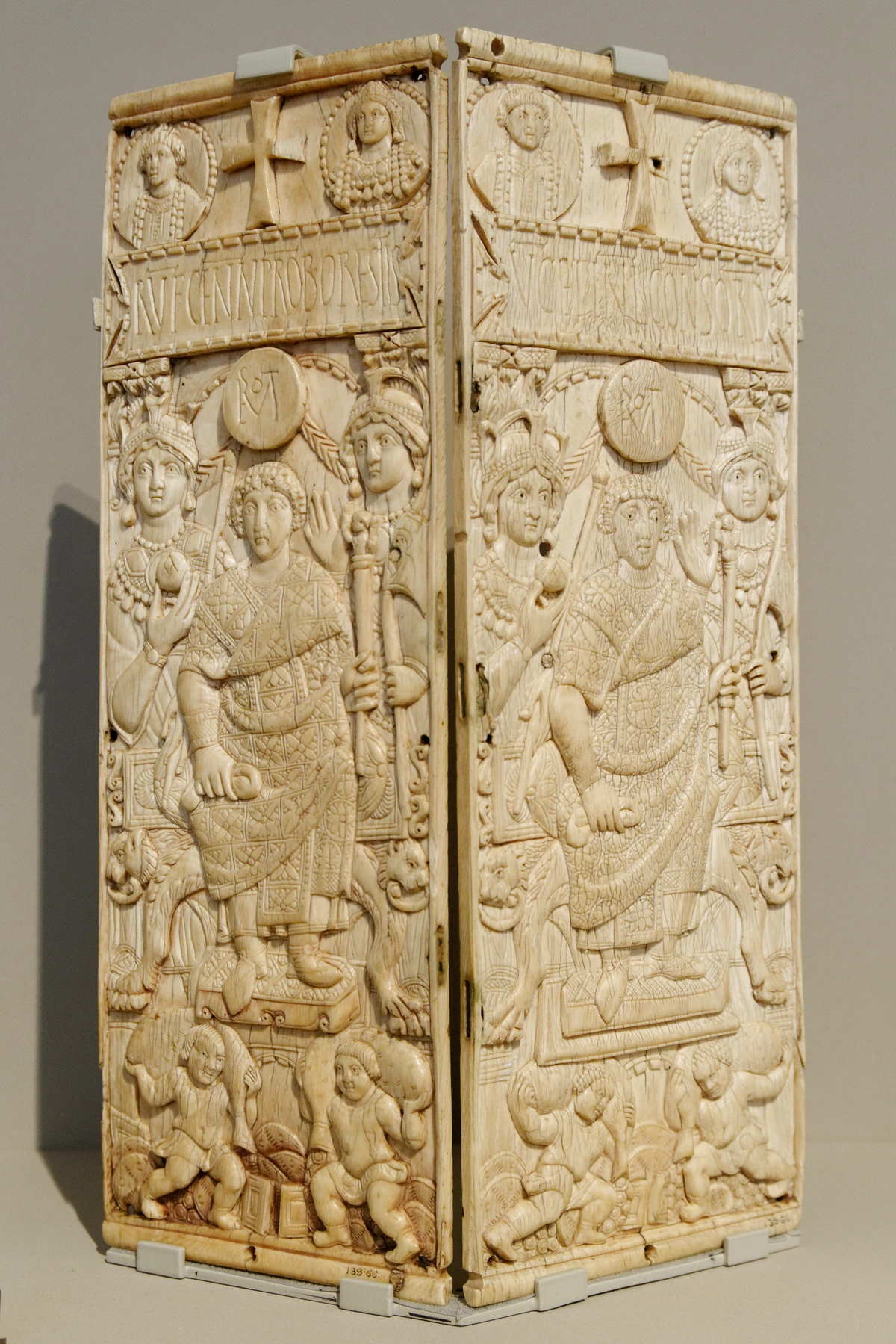 Diptych of Consuls: Rufius Gennadius Probus Orestes, ivory, Constantinople, 534 AD. This diptych, made of ivory, features detailed carvings of figures, inscriptions, and decorative elements. It is a prime example of early Byzantine art and craftsmanship, showcasing the artistic styles and iconographic conventions of the period. The diptych is composed of two panels, hinged together, and is intricately carved with scenes and portraits.