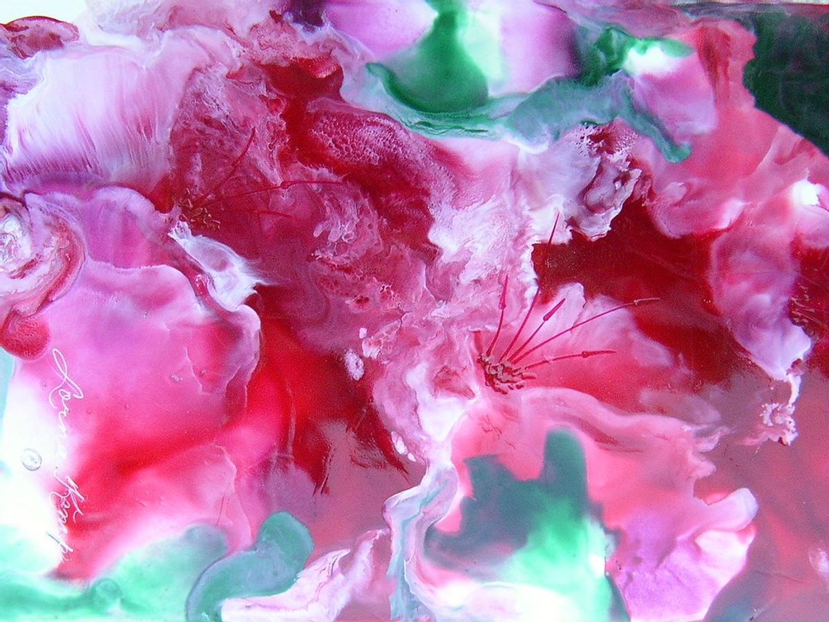 Vibrant pink and red petunia-like flowers created with encaustic beeswax painting technique, showcasing fluid textures and delicate stamen details.