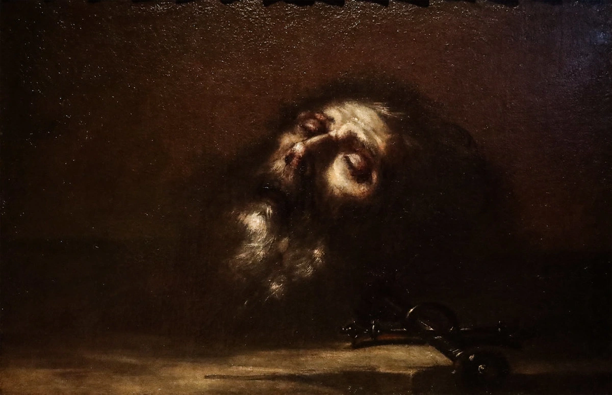 Painting of a severed head in tenebrist style, likely by Sebastián de Llanos Valdés, showcasing dramatic chiaroscuro.